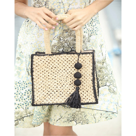 Kimba Crochet Raffia Handbag with Tassel Charm - Natural + Black