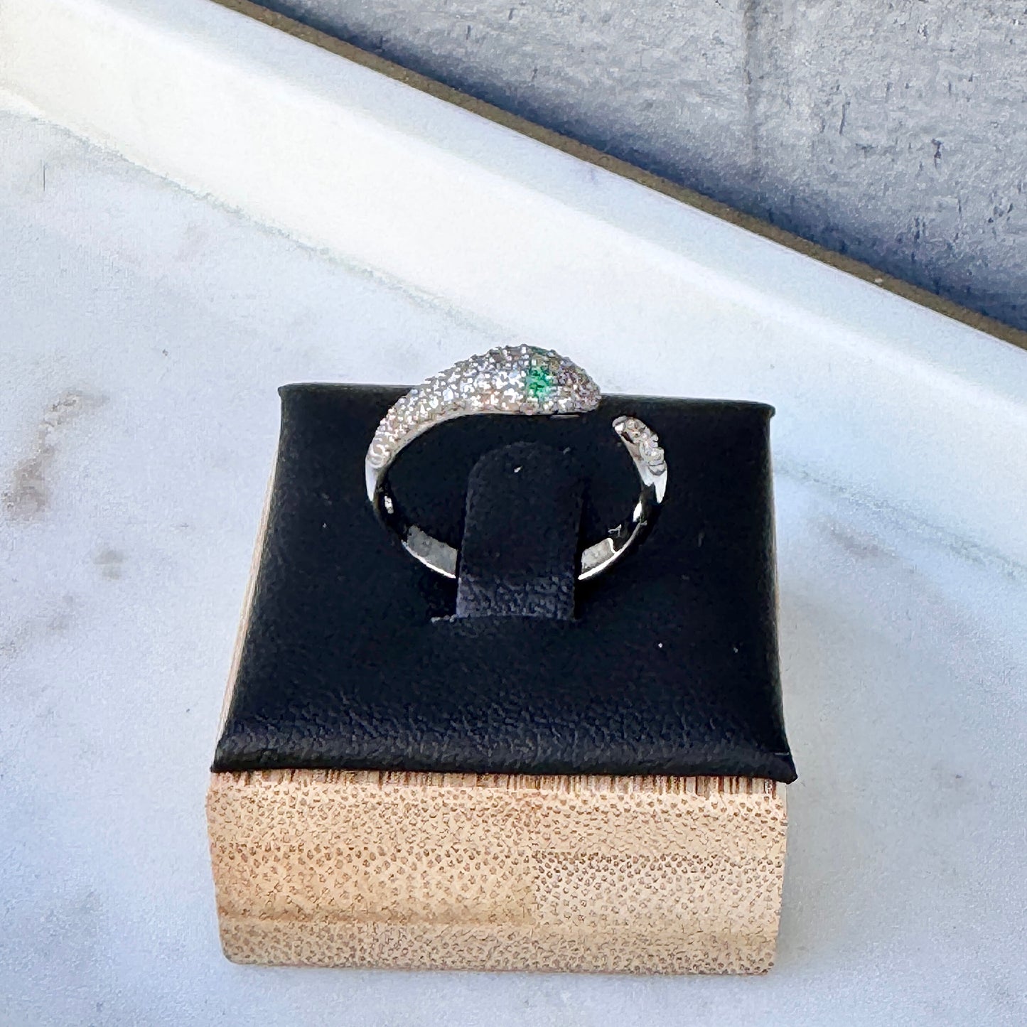 Oxidized Sterling Silver Open Snake Ring with Pavé Diamonds + Emeralds