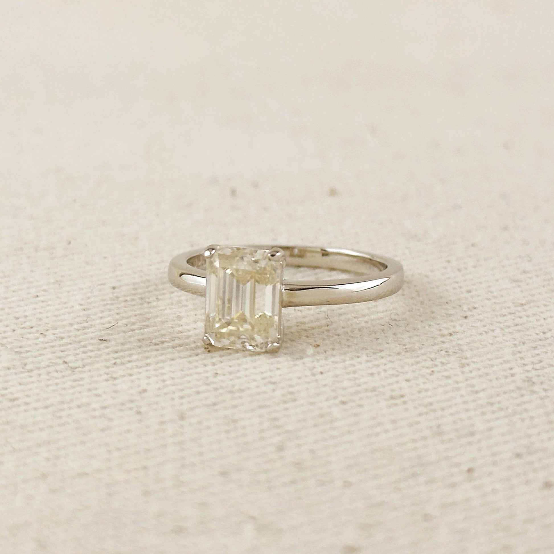 Moissanite Baguette Solitaire Ring - Rhodium Plated Sterling Silver