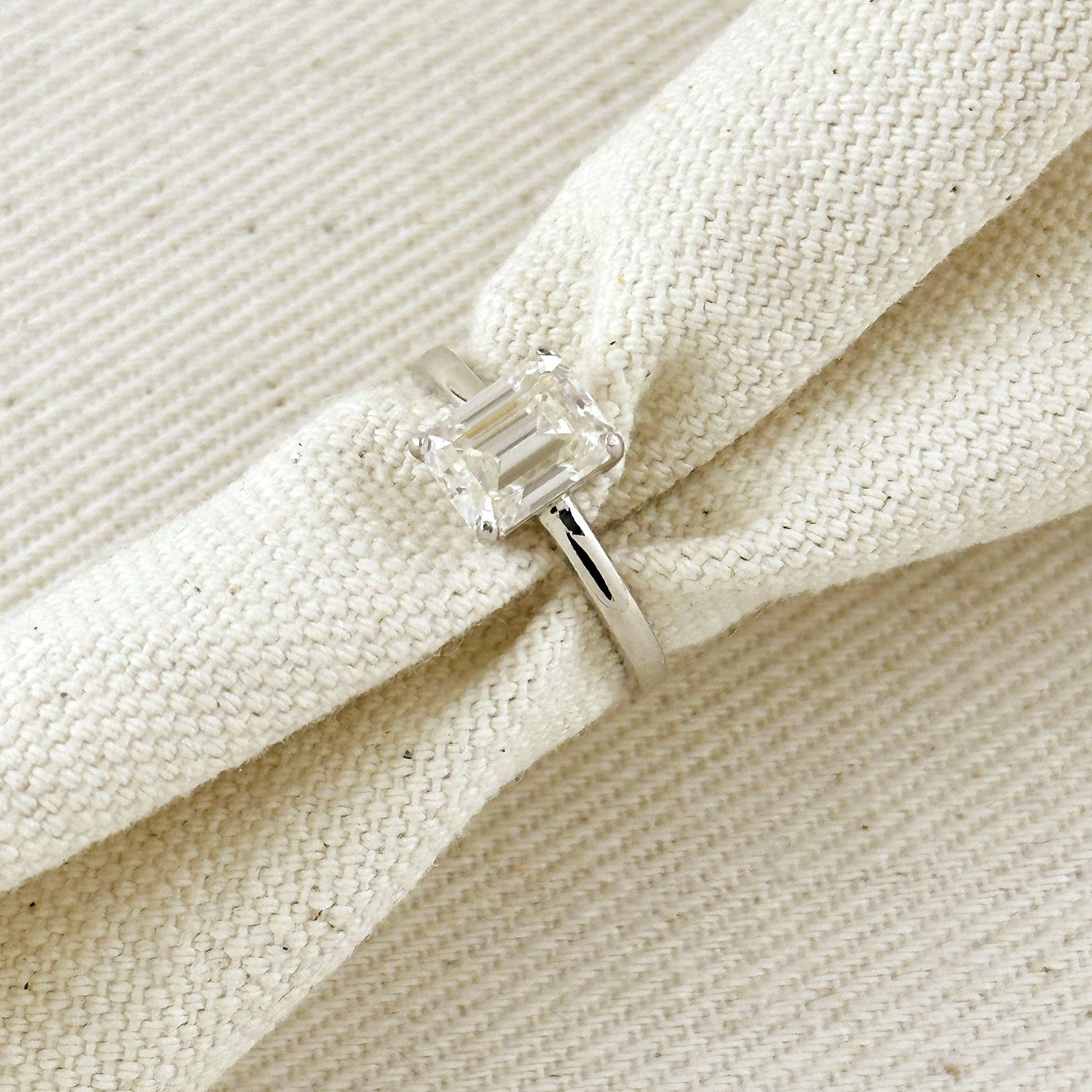 Moissanite Baguette Solitaire Ring - Rhodium Plated Sterling Silver