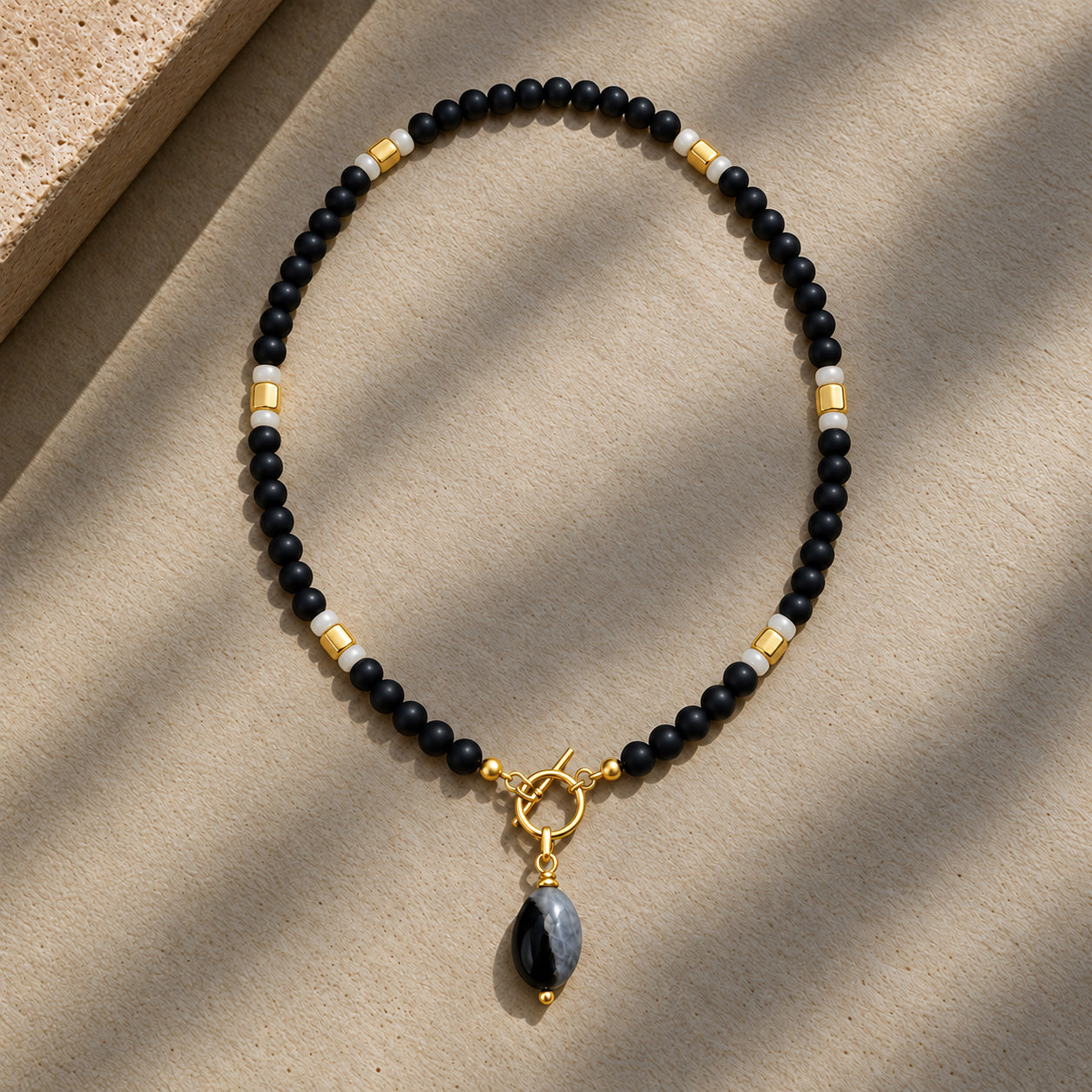 Onyx + Gold Pendant Necklace