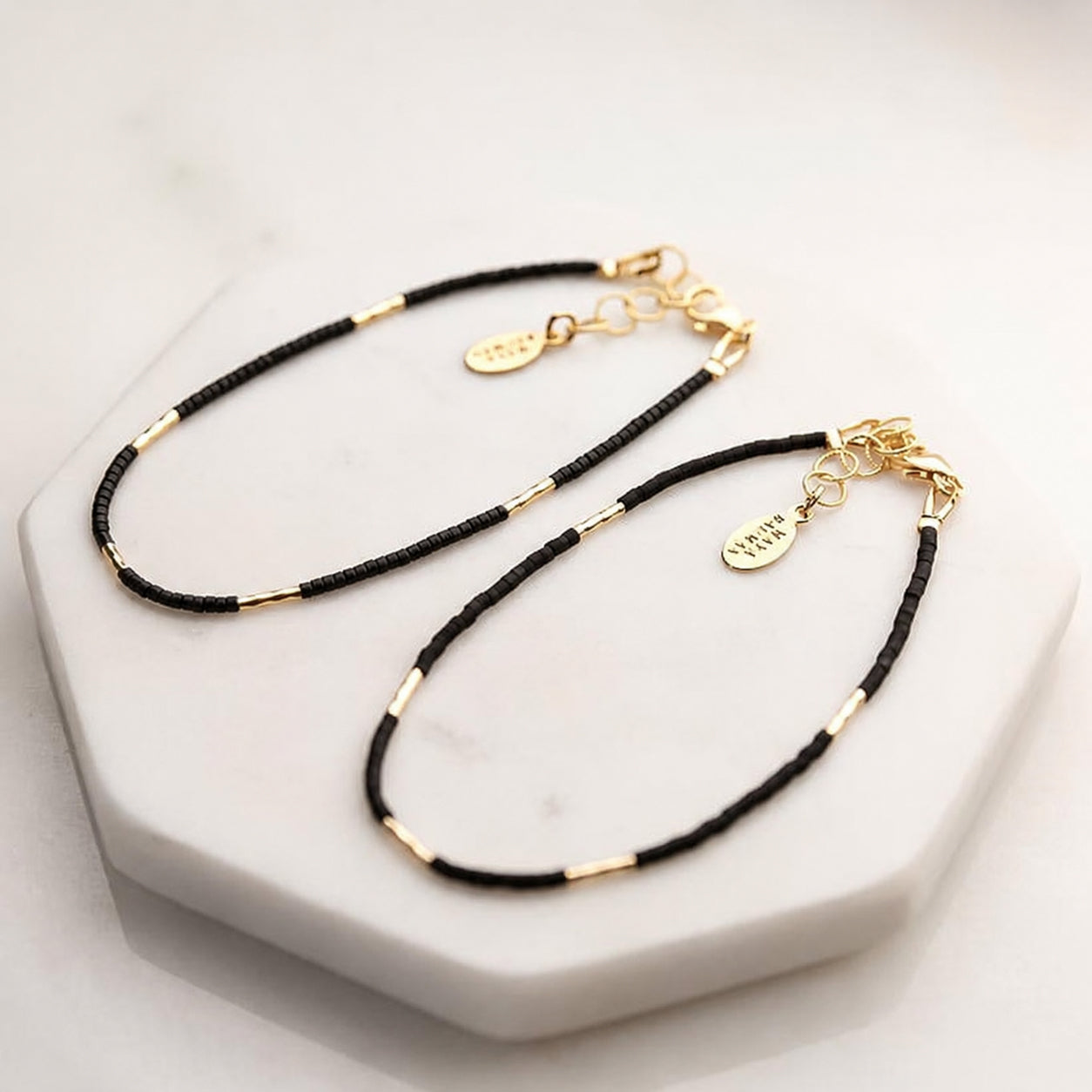 Flow Bracelet – Black + Gold