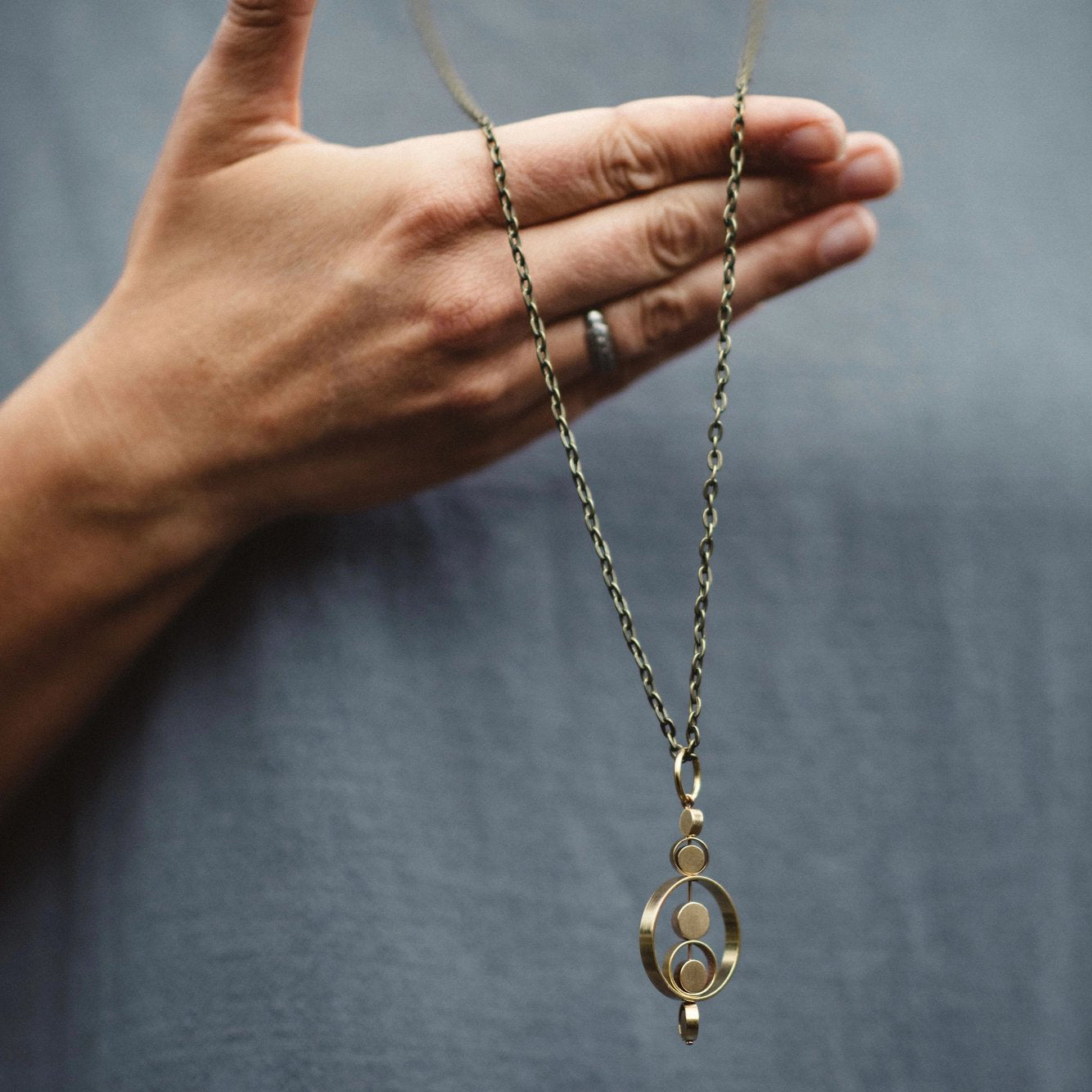 Kinetic Brass Circle Fidget Necklace