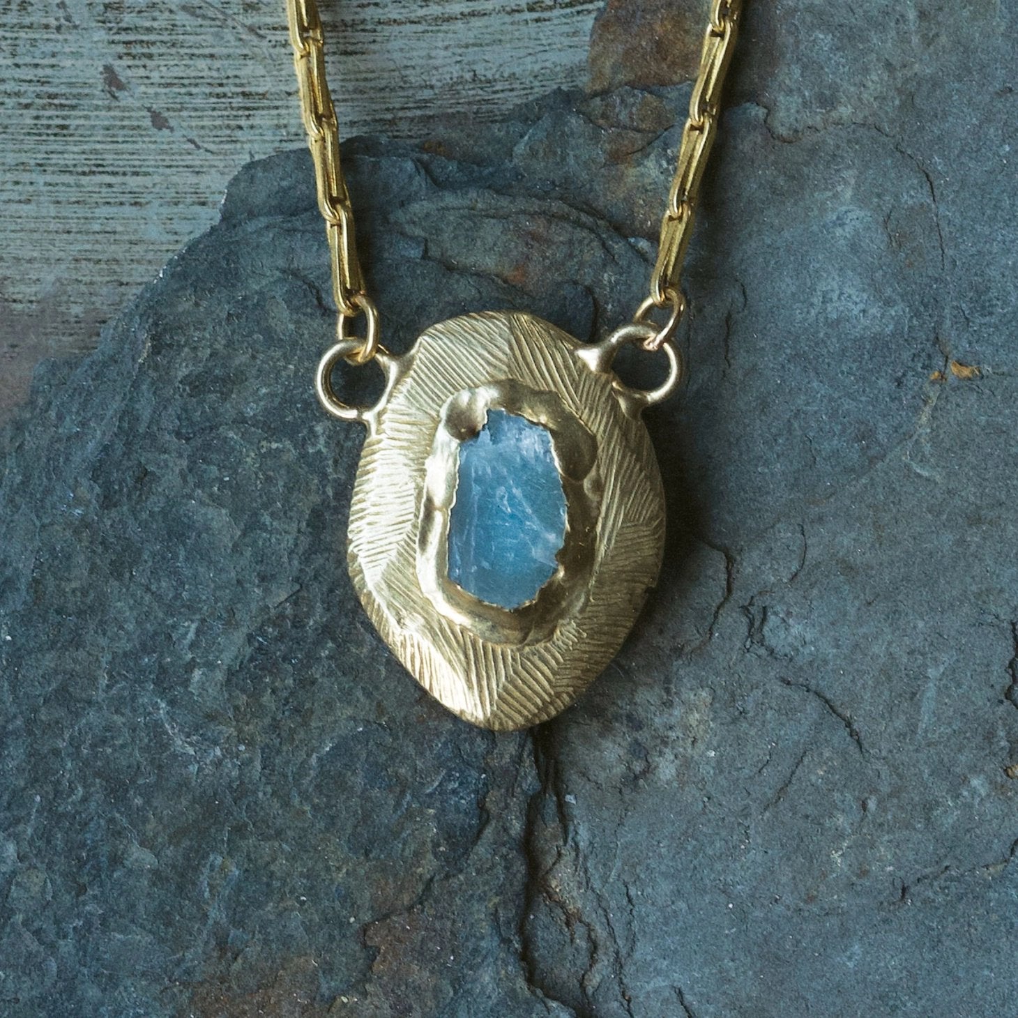 Brass Reflector Pendant Necklace with Raw Aquamarine